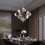 Suspension lumineuse moderne verre noir blanc gris billes translucides chaîne métallique