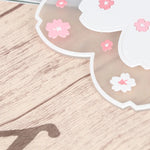 serviettes table décoratives modernes rose gris fleurs clips bordure rose