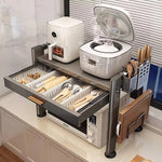 rangement cuisine tiroirs acier inoxydable gris noir moderne batteur cuillères couteaux toaster friteuse