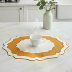 set table orange moderne motifs concentriques bord ondulé infroissable machine texture textile farmhouse