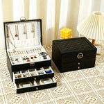 boîte bijoux cuir noir velours intérieur rangements classique poignées dorées bijoux organisation sécurité multifonctionnelle