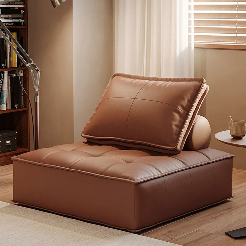 canapé lit moderne cuir noir blanc marron oreillers minimaliste salon