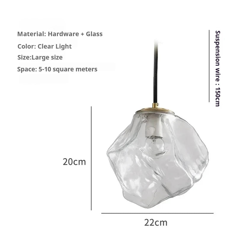 suspension lumineuse moderne transparente dorée texture grumeleuse brillante câble noir salon restaurant chambre principale