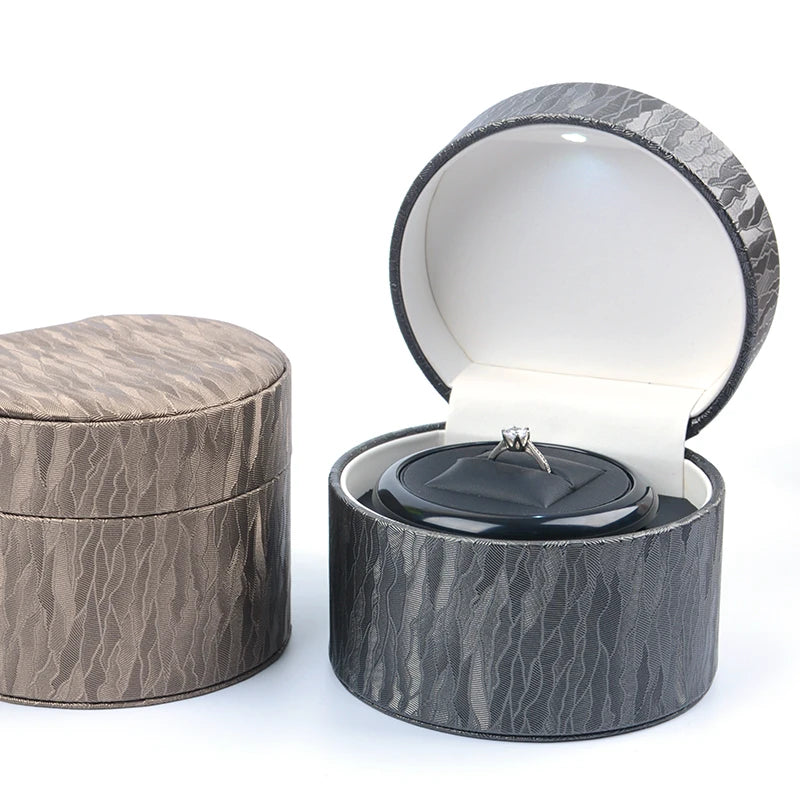 boîte bijoux rotation led noir gris cuir classique anneau rangement présentation mariage professionnel