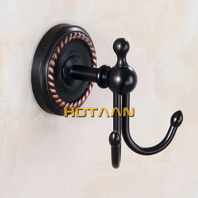 accessoires salle bain noir classiques rondelles dorées porte serviettes savon papier toilette brosse wc