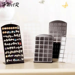 porte boucles d'oreilles moderne velours noir blanc grille perforations pieds boucles d'oreilles.storage organizer