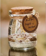 bougie verre étoiles mer coquillages sable transparent rose anniversaire mariage noël festive