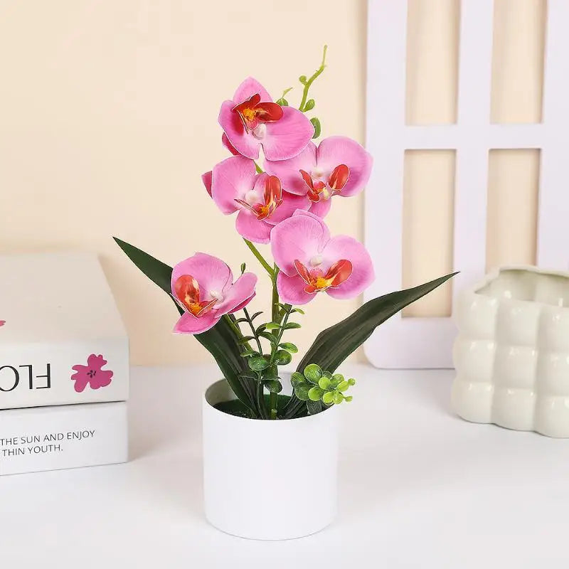 décoration intérieure orchidées artificielles pots blancs fleurs simples feuilles vertes moderne