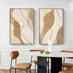 tableau abstrait moderne minimaliste toile points dorés lignes courbes beige blanc noirintérieur décoration chambre