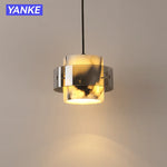 lampes suspendues moderne pierre marbre jaune blanc gris salle chambre semi transparent anneaux métalliques