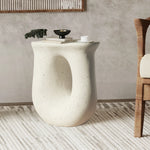 table d'appoint moderne béton léger blanc taches noires texture granulée