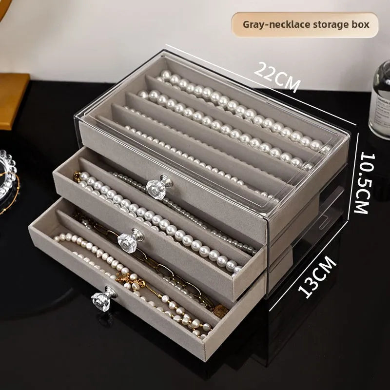 boîte bijoux velours beige clair poignées moderne rangement colliers bagues montres boucles d'oreilles