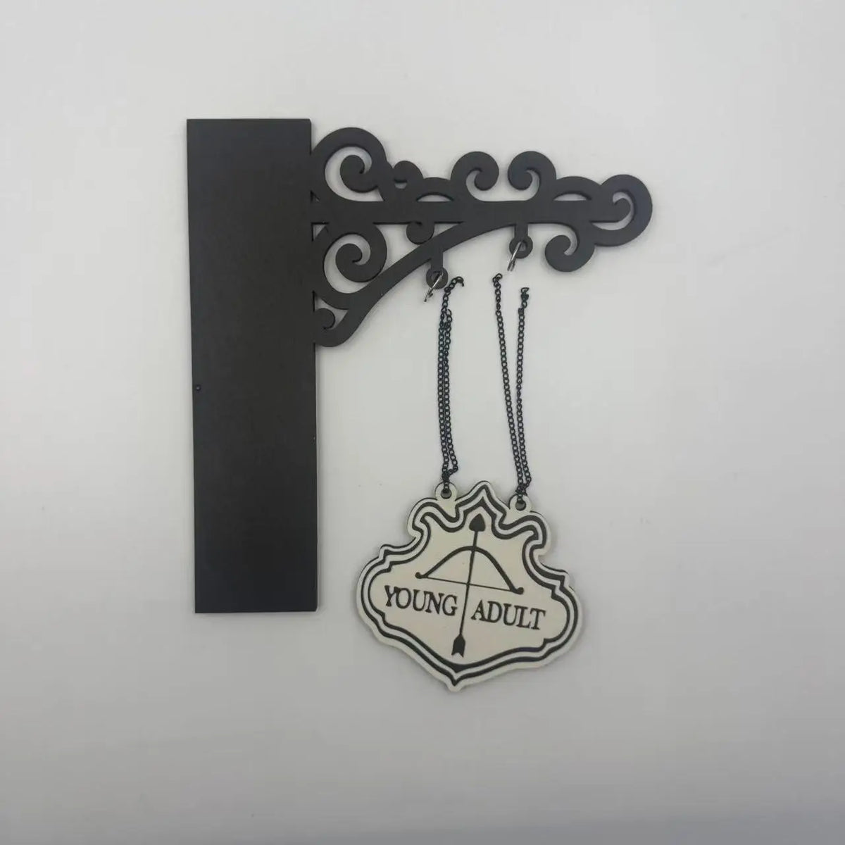 supports muraux livres pendentifs décoratifs gothiques ornements floraux arches métalliques pendentifs translucides motifs bibliothèque