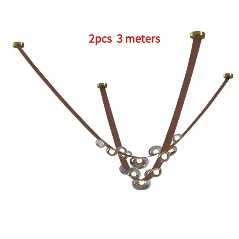 Suspension lumineuse contemporaine boules translucides structure métallique noir marron doré minimaliste