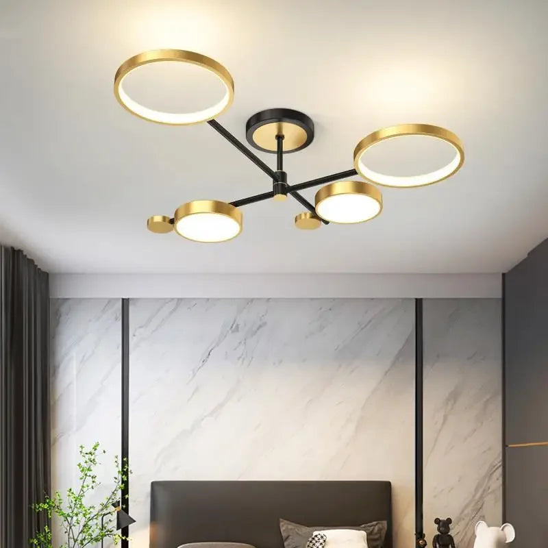lustre moderne suspension lumineuse tête métallique noir or lisse géométrique chambre salon