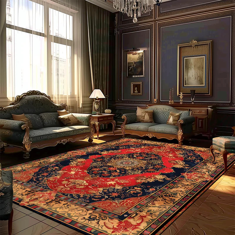Cette image montre un intérieur de luxe avec un salon richement décoré, comprenant des meubles anciens et des textiles ornementaux, ainsi qu'un grand tapis persan aux couleurs vives.