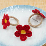 fleurs crochetées main artisanale tringle decoration table mariage pique nique brunch après midi thé