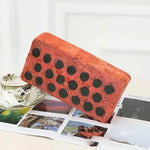 oreiller brique rouge brun rustique mousse mémoire forme rectangulaire texture taches noiresmassage coton polyester
