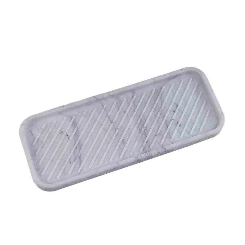 plateau rangement moderne noir blanc rayures diagonales distributeur savon gant toilette flacon parfum huiles