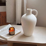vase poterie moderne gris beige fleur séchée décoration intérieure texture marbrée lisse rustique arrangement