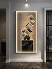 décoration murale moderne cubes métalliques pyramide fond texturé couleur noir doré chambre salon