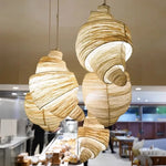 suspension lumineuse tissu spirale moderne beige marron clair câble suspendu chambre salon étude
