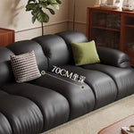 Canapé moderne simili cuir noir profond 70cm coussins