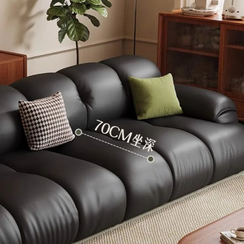 Canapé moderne simili cuir noir profond 70cm coussins