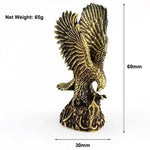 statuette aigle dorée détails fins plumage stylisé décoration artisanal opaque réaliste animal compagnie
