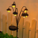lampe solaire moderne fleur noir doré feuilles vertes extérieure jardin ambiance led ip65 étanche