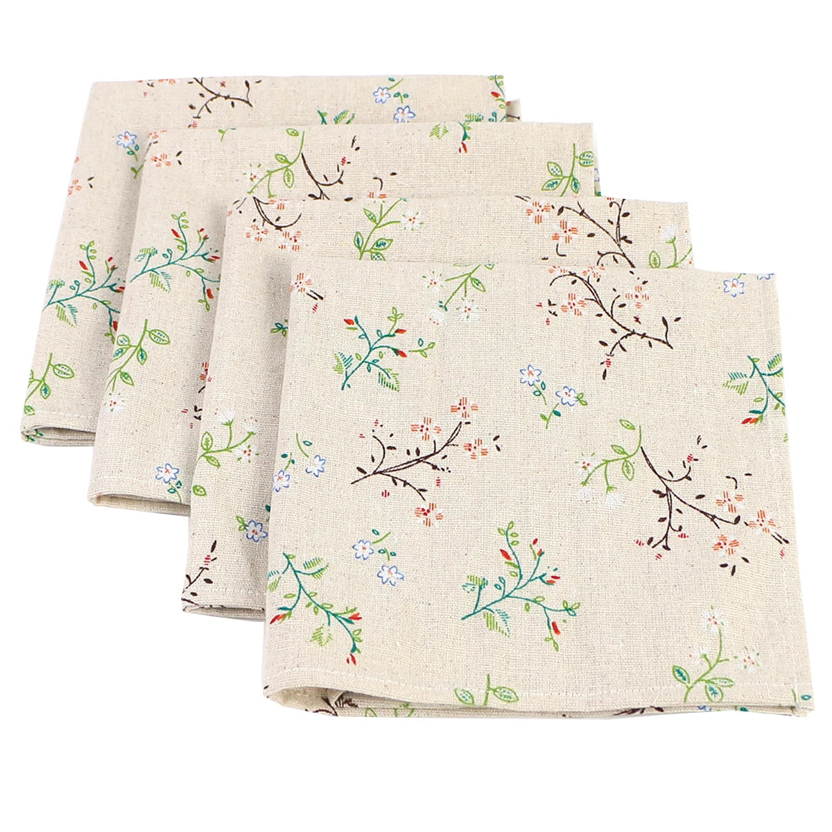 Des serviettes de table en lin imprimées de motifs floraux et végétaux délicats, créant une ambiance naturelle et apaisante.