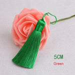 pompons polyester couleur variée 5cm longueur 18cm décoration artisanale rideaux couture pièces