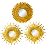 Détail du cadre en PVC doré et du miroir rond