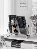 rangements transparent moderne compartiments stylos telephone livre rubans maquillage calendrier notes clavier