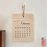 calendrier mural tissu beige clair rustique minimaliste clip magnétique ficelle décembre 2026 opaque
