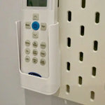boîte rangement télécommandes blanc texture rugueuse adhésif pratique moderne stockage