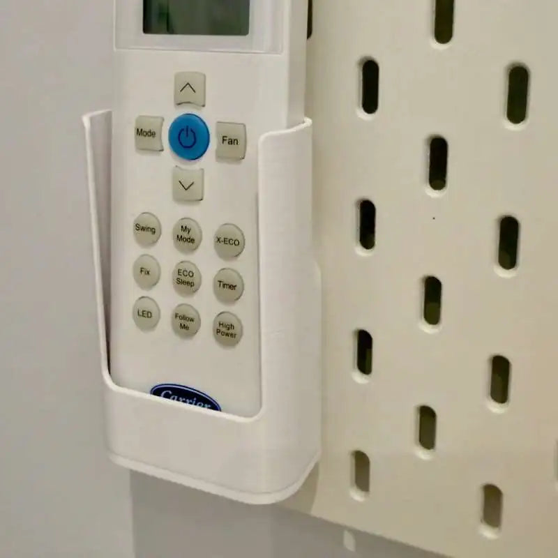 boîte rangement télécommandes blanc texture rugueuse adhésif pratique moderne stockage