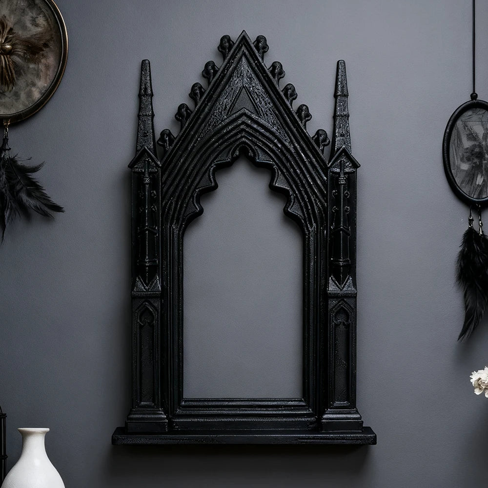 miroir gothique noir orné pointes décoration murale foncé sculpté