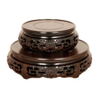 support circulaire bois sculpté artisanal traditionnel marron foncé détails complexes vase plantes décoration maison