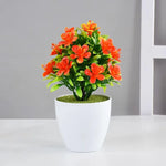 plantes artificielles bonsaï violettes rouges jaunes blanches pot blanc mousse verte décoration moderne extérieur