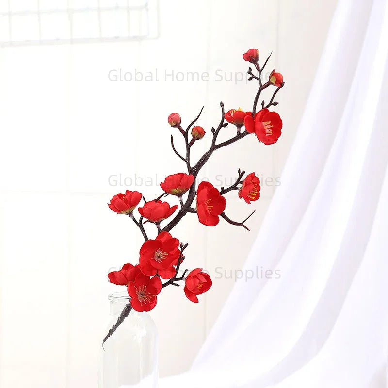 décoration intérieure branche fleurs artificielles rouge blanc rose naturel minimaliste