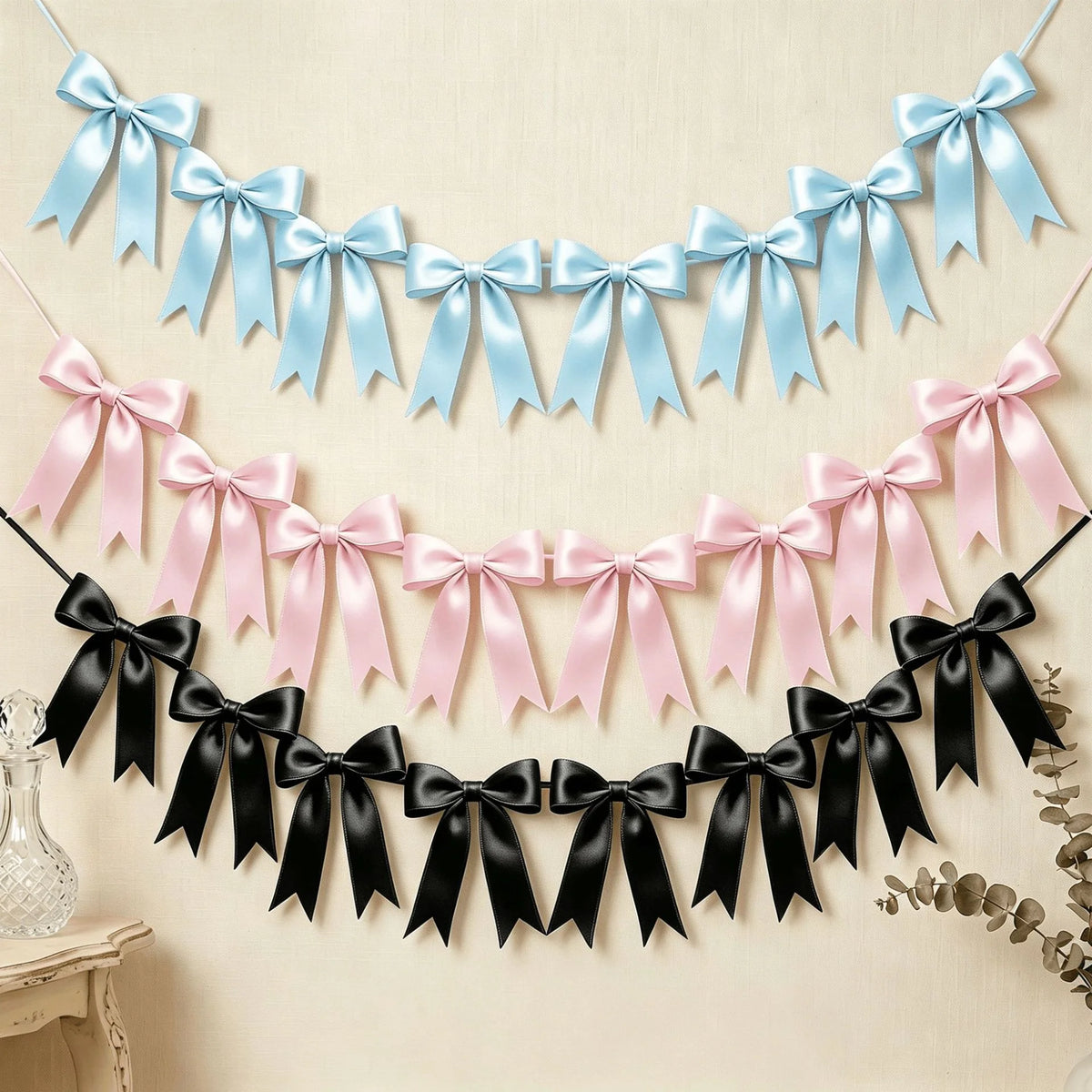 guirlande décorative nœuds papillon satin bleu clair rose noir mariage anniversaire fête