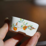 bol traditionnel décoré fruits pommes paysage motifs ondulés blanc orange bleu