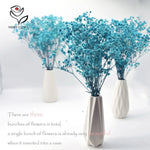 Bouquet fleurs artificielles bleu clair petites fleurs rondes décoration moderne vase inclusion
