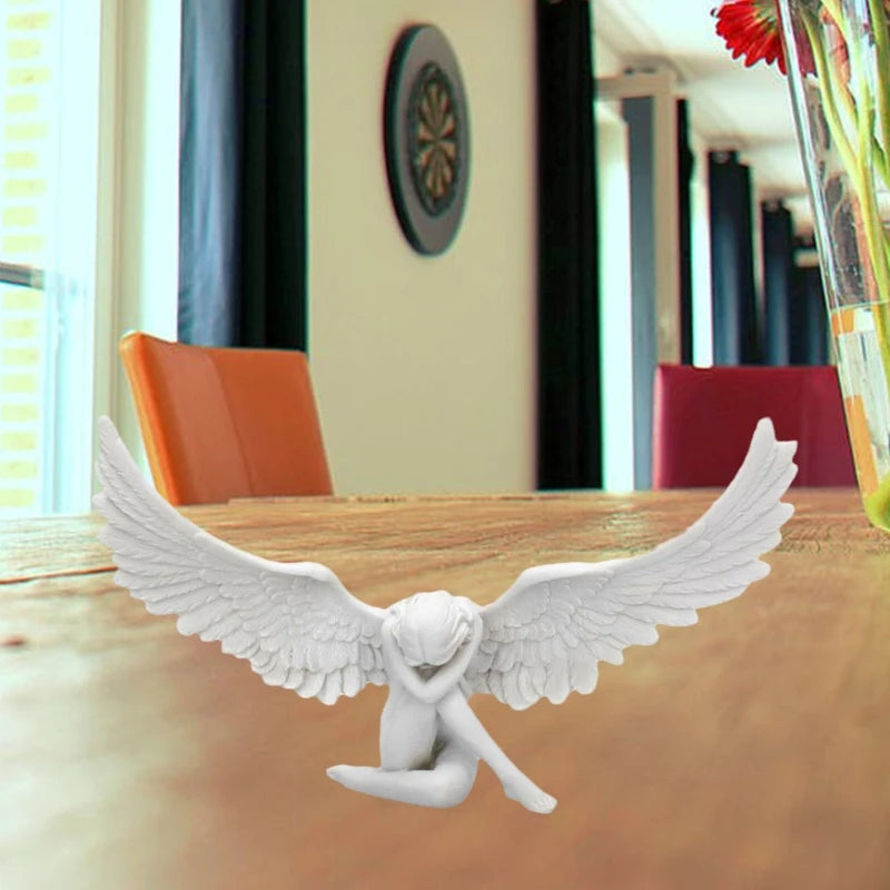 statue ange accroupi ailes plumes finition mate decoration blanche sculptural artistique tristesse