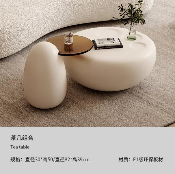 canapé lit blanc bouclé moderne table basse coussins décoratifs