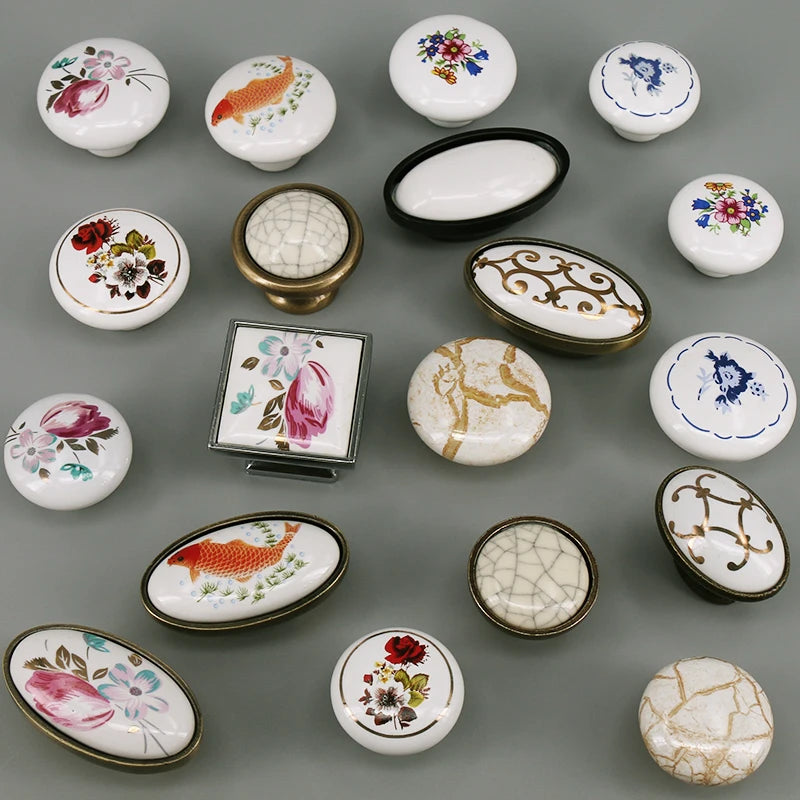boutons meuble céramique blanc or noir fleurs poissons géométriques classiques
