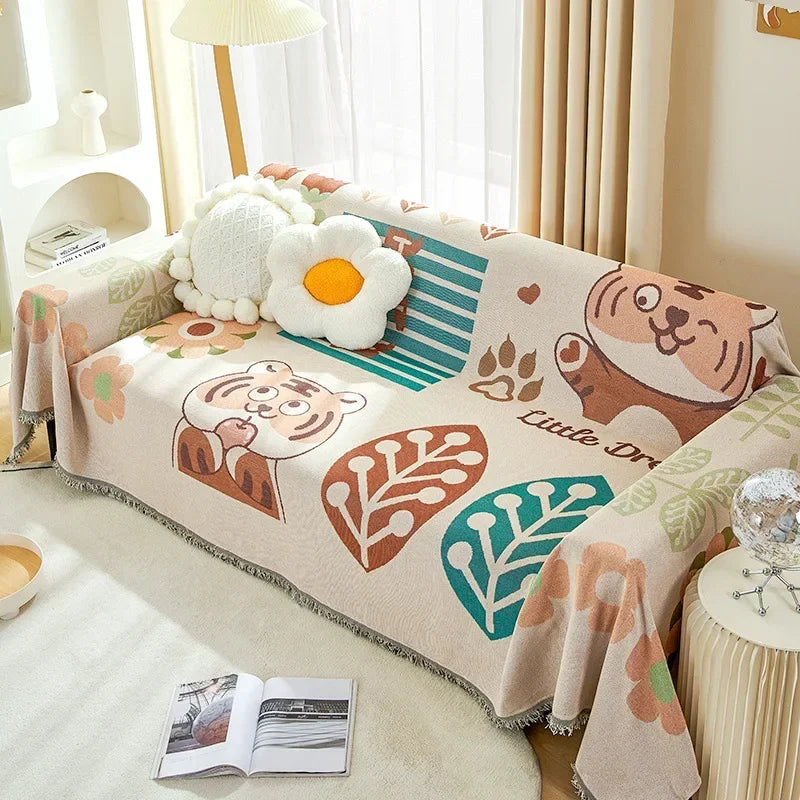 couverture canapé moderne motif floral animaux beige vert orange bleu oreillers décoratifs