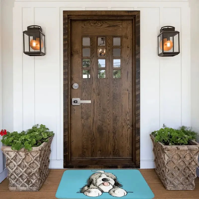 Détail du motif Bearded Collie sur tapis bleu marine