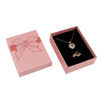 boîte rangement bijoux or rouge argent noir brillants rubis classique élégant pendentifs fermeture éclair